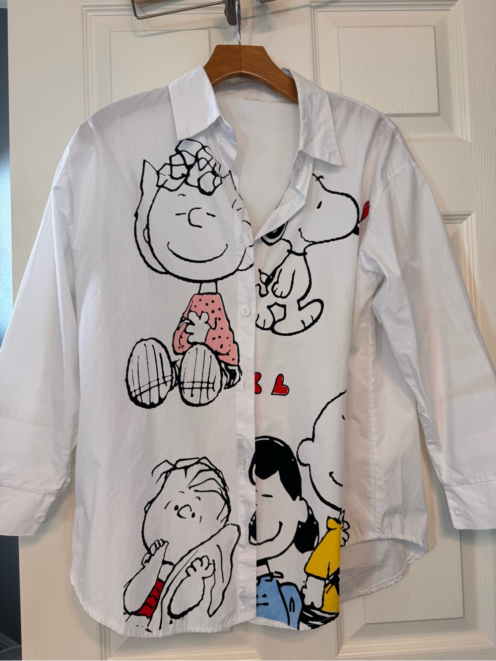 White Peanuts Graphic Button-Down Shirt with Pink and Yellow Accents